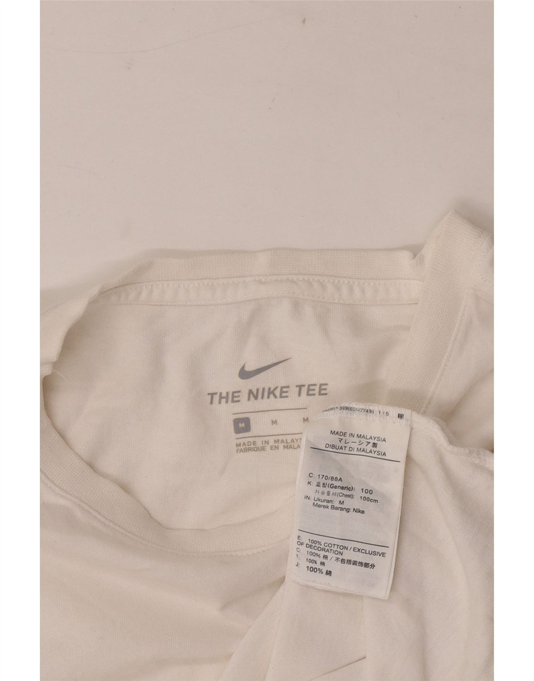 Мужская футболка Nike из хлопка белого цвета среднего размера