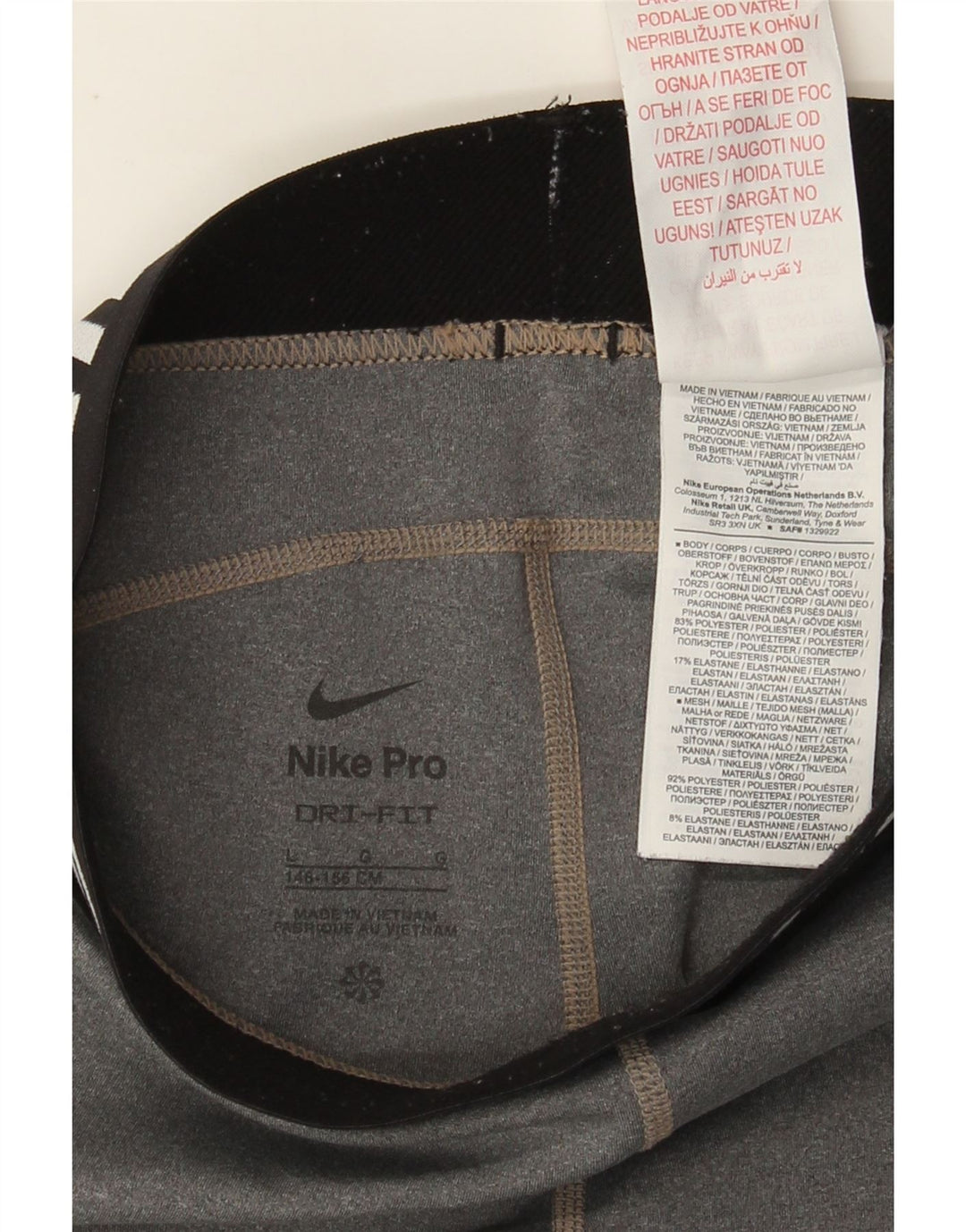 Леггинсы с рисунком Nike для девочек 12–13 лет, большой серый цвет, полиэстер с цветными блоками