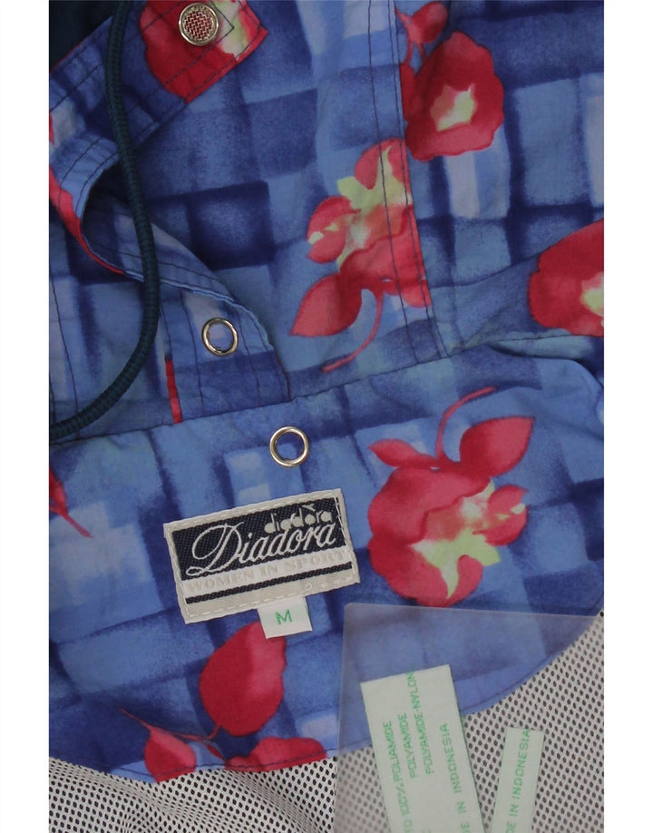 Женская дождевик оверсайз с капюшоном Diadora UK 14, средний синий полиамид