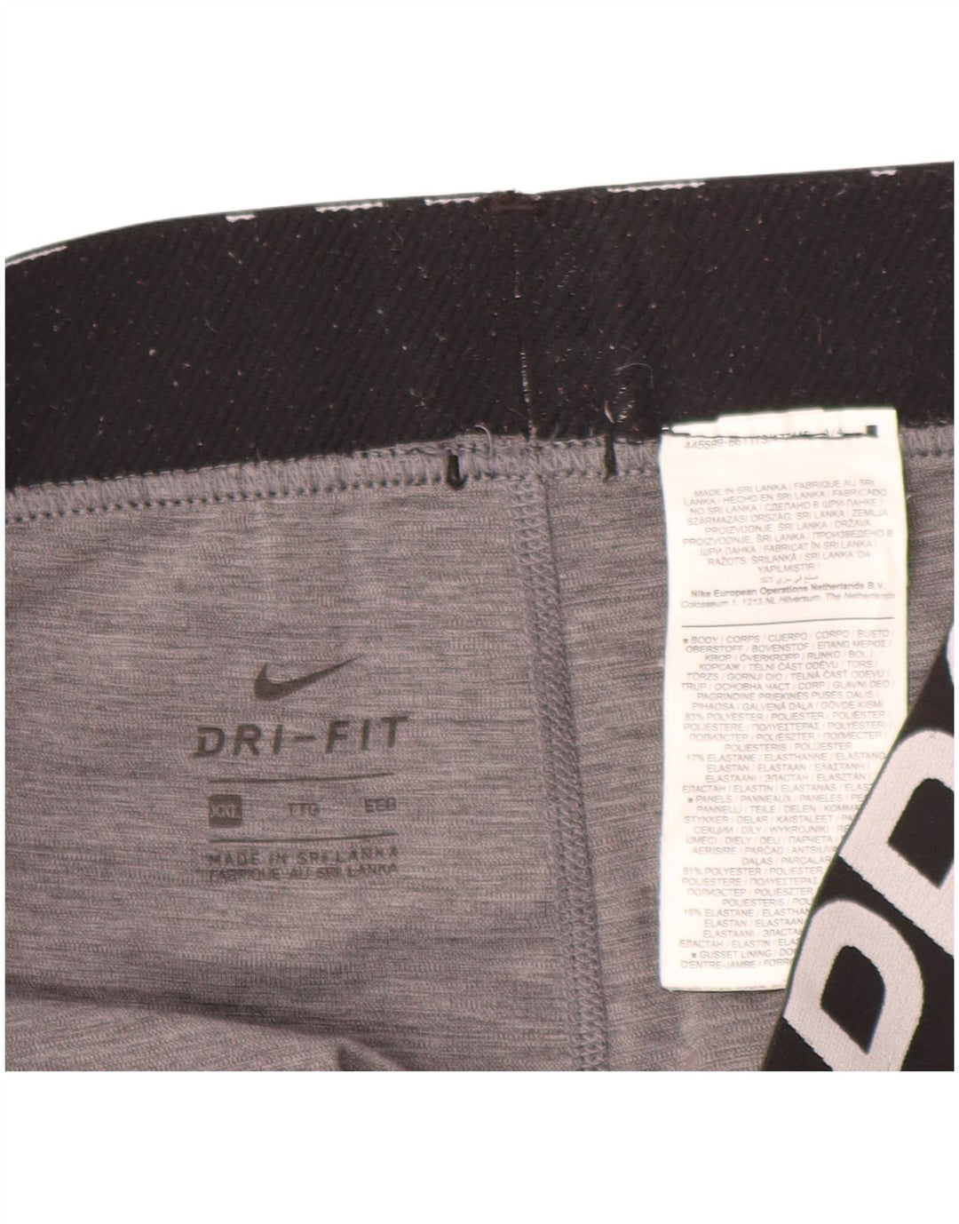 Женские леггинсы-капри NIKE Dri Fit с рисунком, Великобритания, 20, 2XL, серые с цветными блоками