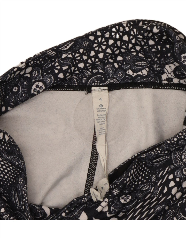 Женские леггинсы-капри Lululemon, США 4, маленький размер, черный полиэстер с цветочным принтом