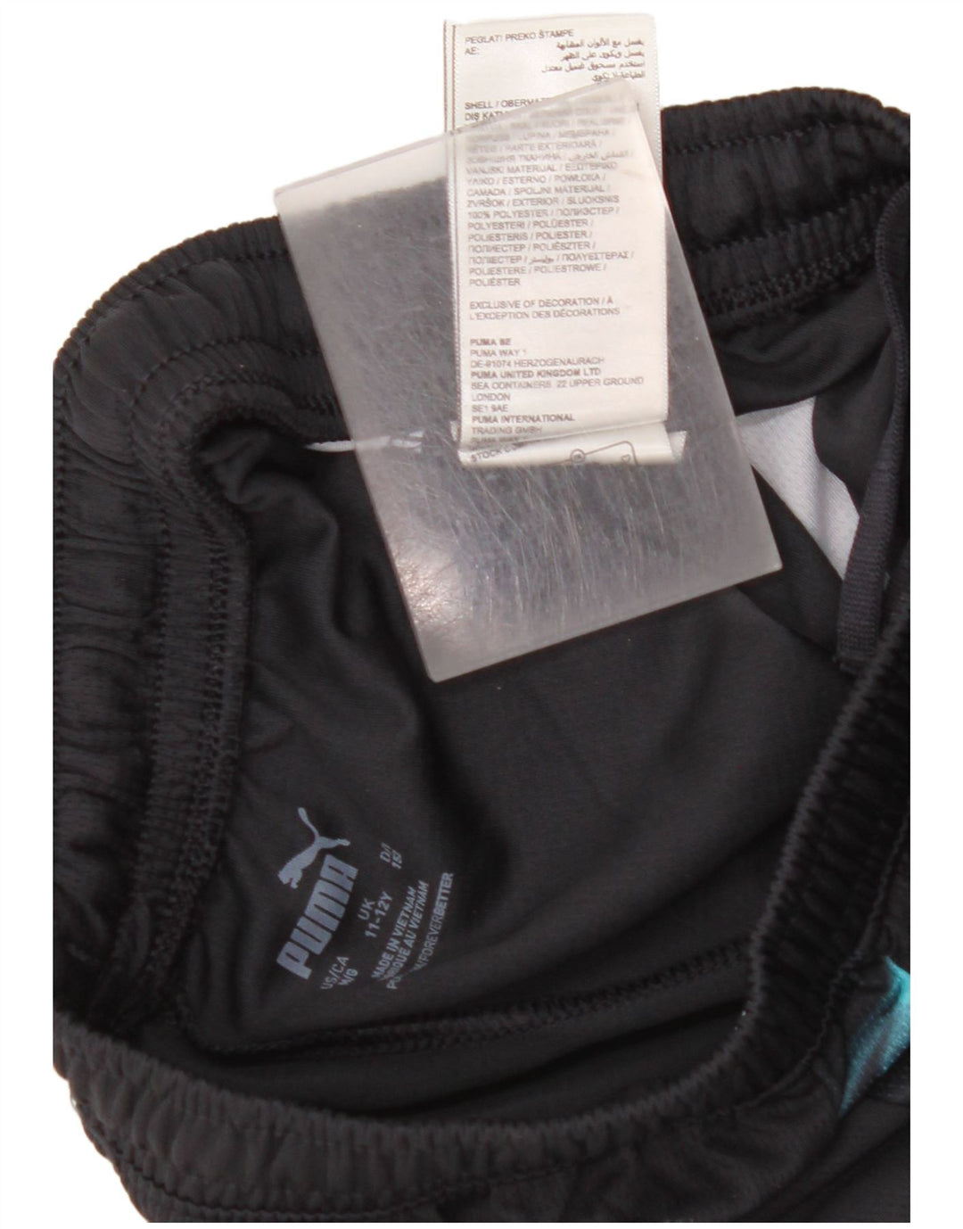 Спортивные шорты PUMA для мальчиков Manchester City 11–12 лет, черные с цветными блоками