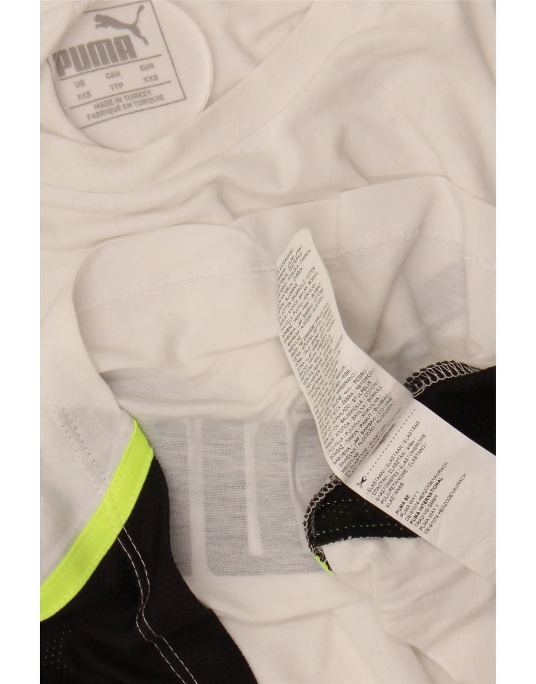 Женская укороченная футболка оверсайз с графическим рисунком PUMA UK 2 2XS белая с цветными блоками