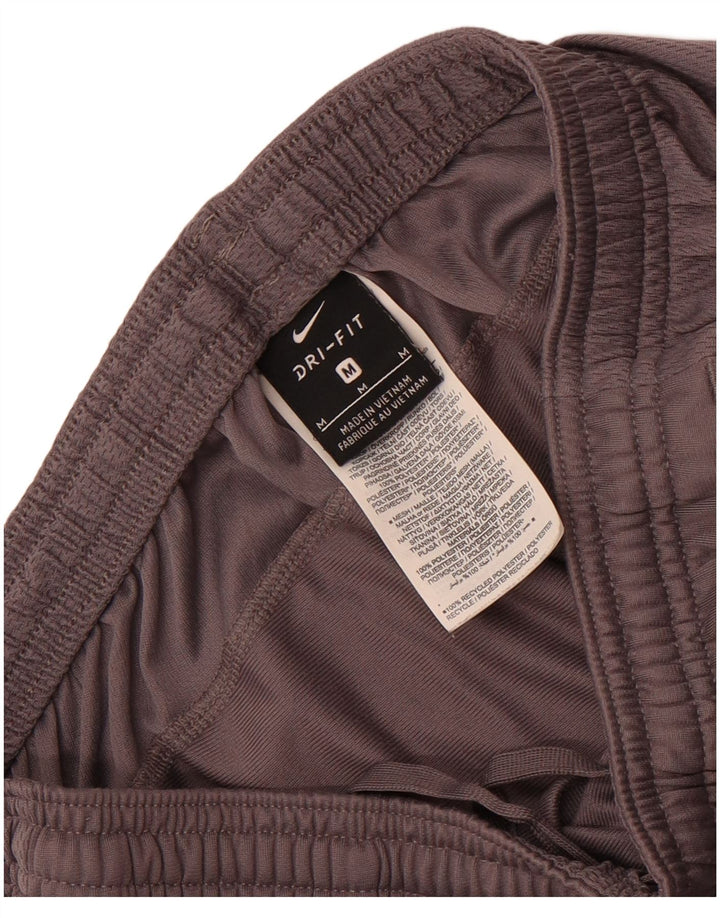 Мужские спортивные брюки Nike Dri Fit среднего серого цвета из полиэстера с цветными блоками