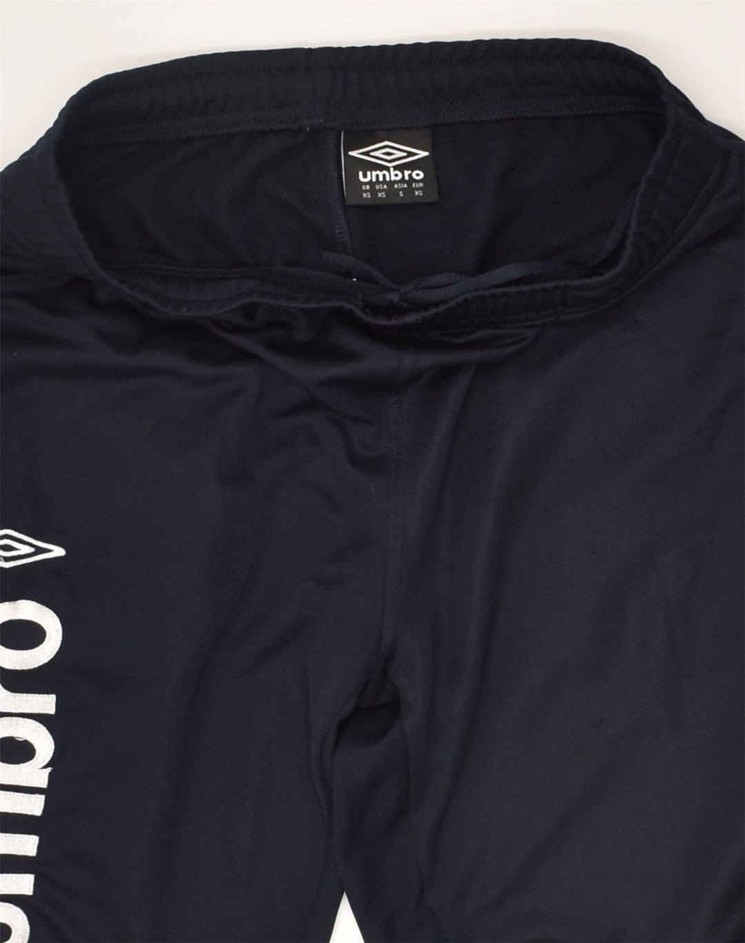 UMBRO Mens Graphic Tracksuit Trousers Joggers XS Navy Blue Polyester | Vintage Umbro | Thrift | Second-Hand Umbro | Used Clothing | Messina Hembry 