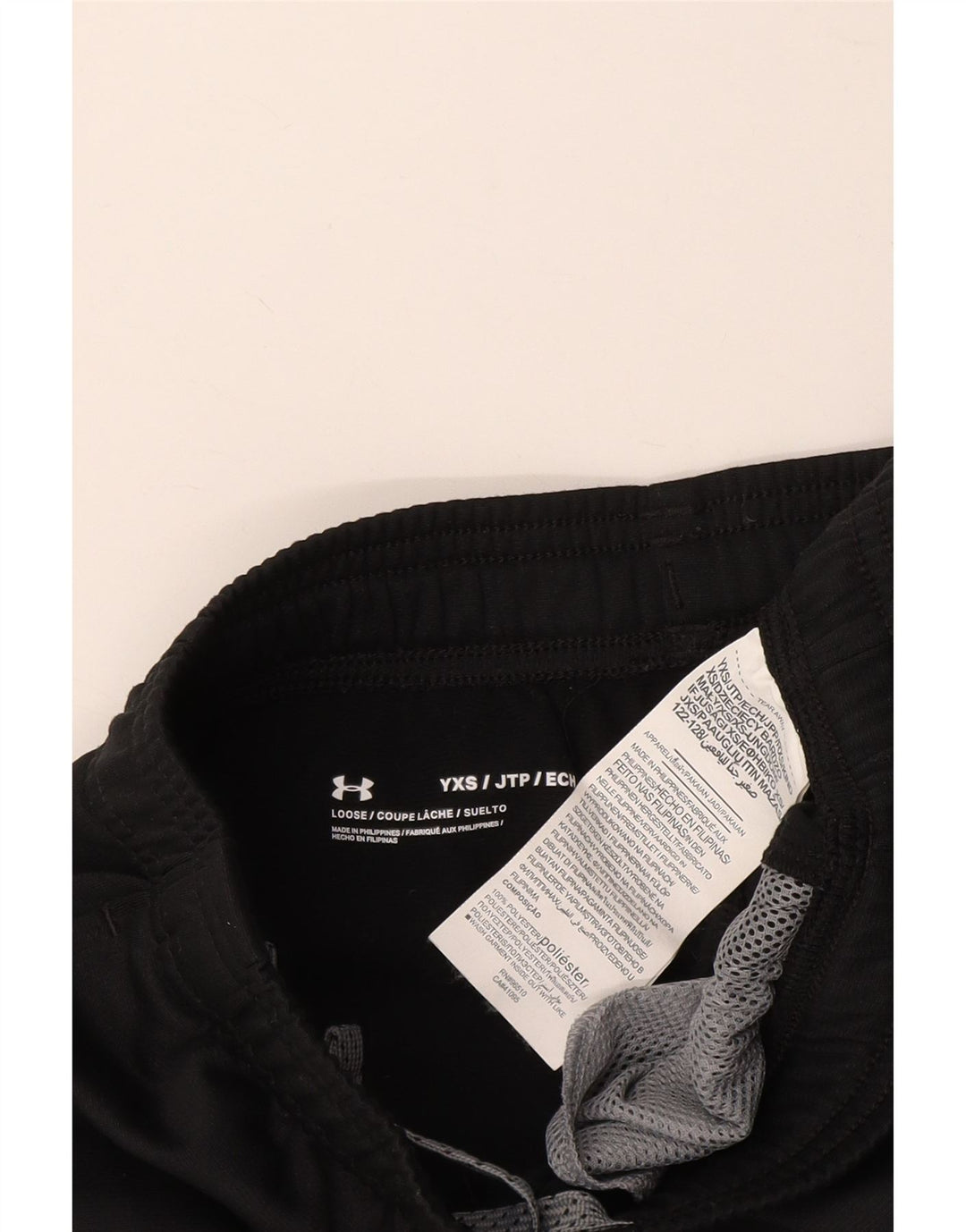 Спортивные брюки UNDER ARMOR для мальчиков 6-7 лет XS W22 L22, черные