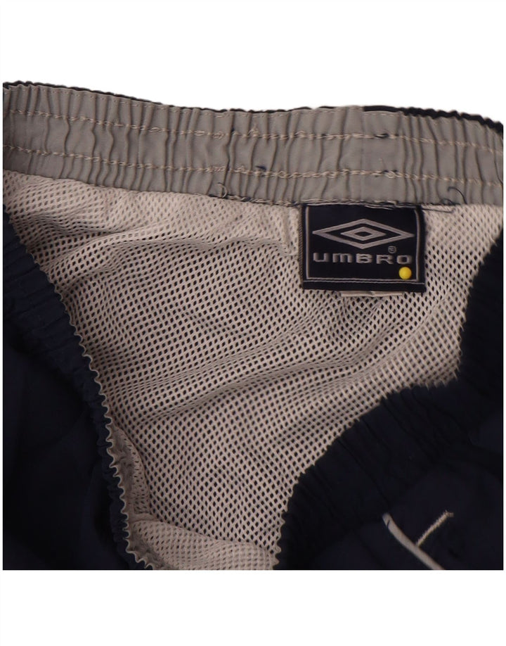 Спортивные шорты Umbro с графическим рисунком для мальчиков 9–10 лет, средние темно-синие, полиэстер