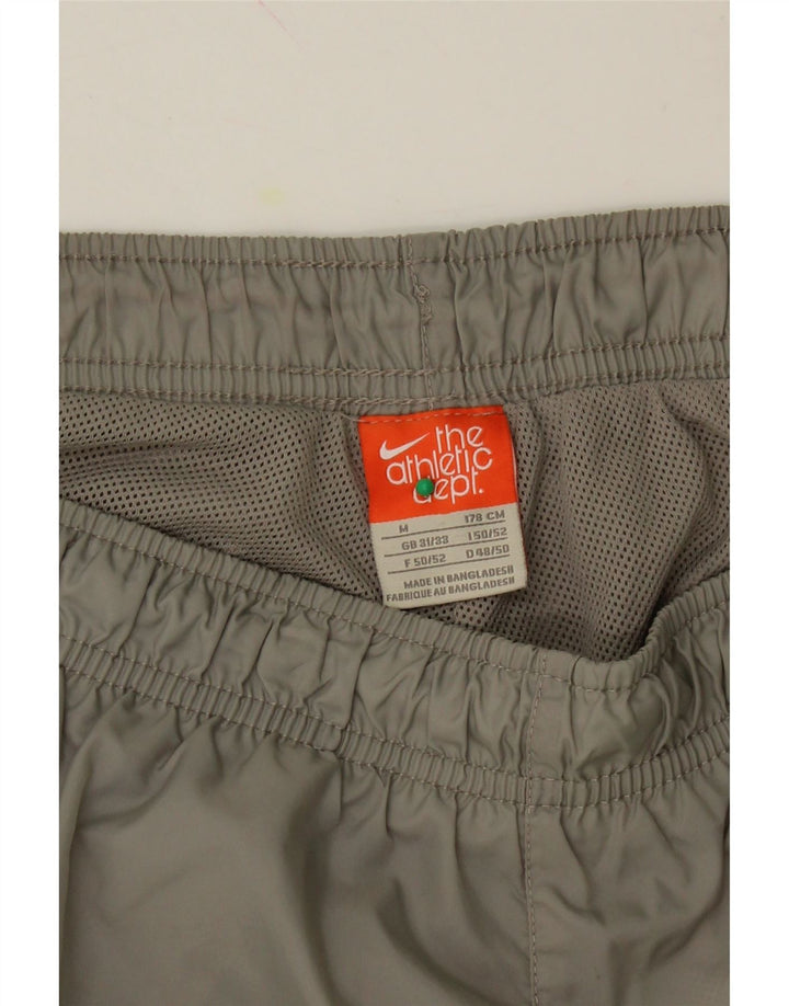 NIKE Mens Tracksuit Trousers Medium Grey Nylon Vintage Nike and Second-Hand Nike from Messina Hembry 