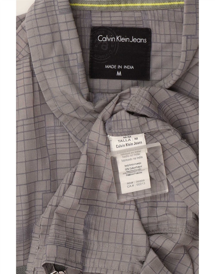 Мужская рубашка Calvin Klein Jeans среднего серого цвета в клетку из хлопка