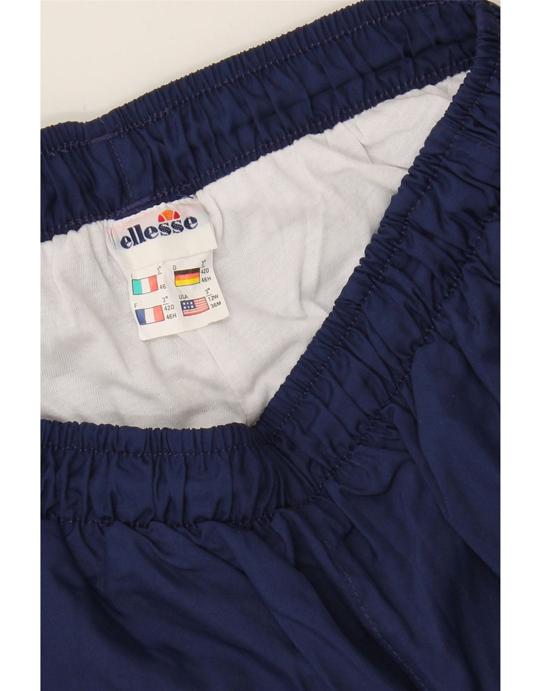 ELLESSE Womens Tracksuit Trousers IT 42 Medium  Navy Blue Polyester Vintage Ellesse and Second-Hand Ellesse from Messina Hembry 