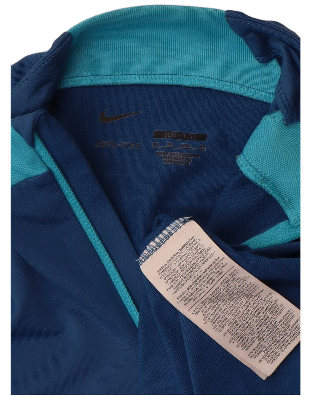 Мужской тонкий пуловер спортивного костюма с воротником на молнии Nike Dri Fit XS, синий с геометрическим узором