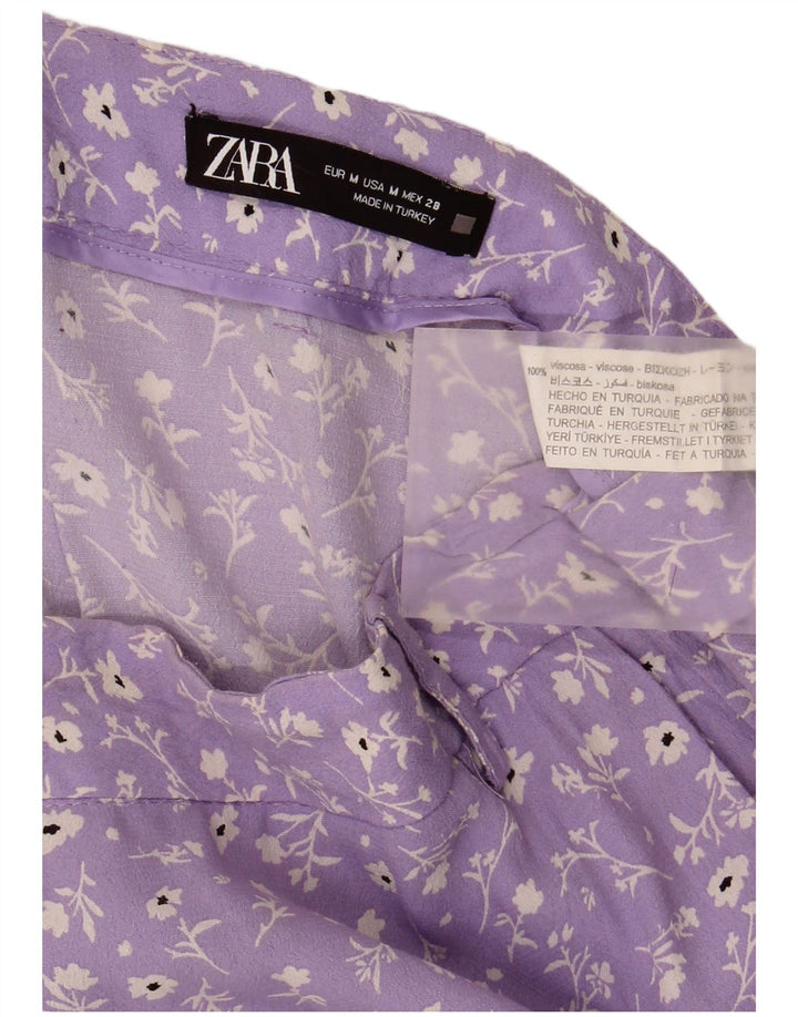 Женская мини-юбка Zara Medium W28 из вискозы фиолетового цвета с цветочным принтом