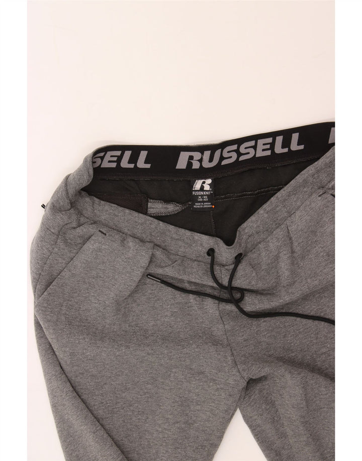 RUSSELL ATHLETIC Mens Tracksuit Trousers Joggers XL  Grey Polyester Vintage Russell Athletic and Second-Hand Russell Athletic from Messina Hembry 
