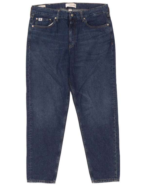 Мужские зауженные джинсы Calvin Klein W33 L30 синие, хлопок