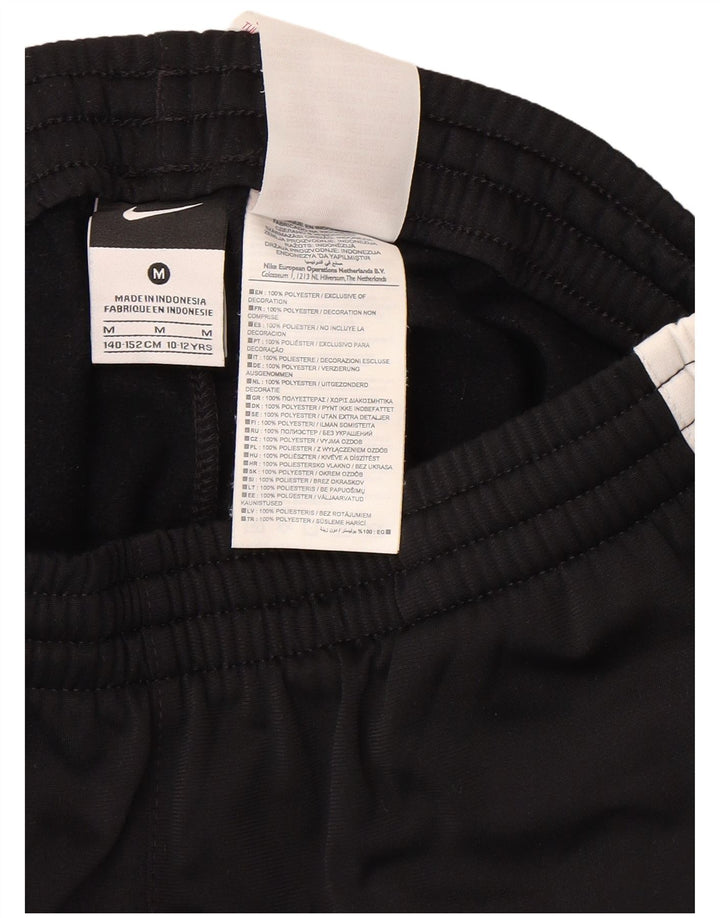 Спортивные брюки Nike для мальчиков с графическим рисунком, 10–11 лет, средние черные с цветными блоками