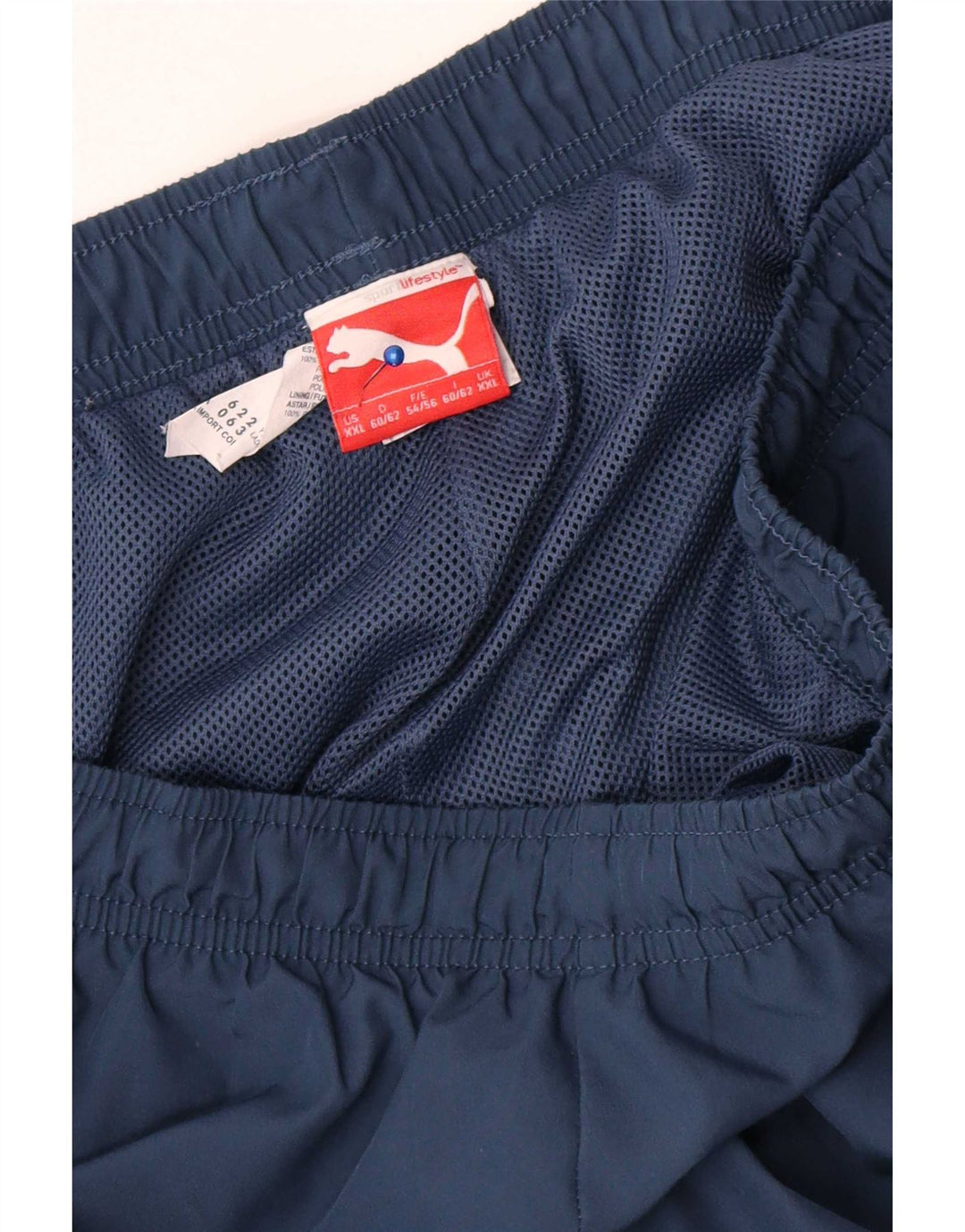 Мужские спортивные брюки-капри с рисунком Puma 2XL темно-синие из полиэстера