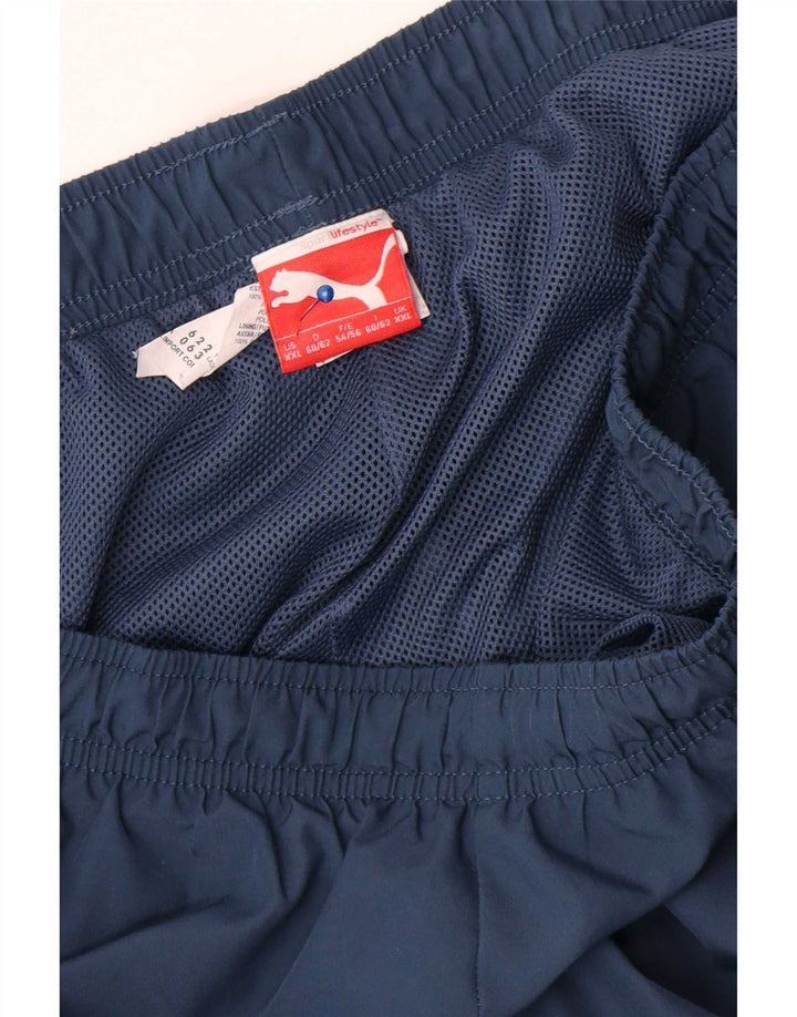 Мужские спортивные брюки-капри с рисунком Puma 2XL темно-синие из полиэстера