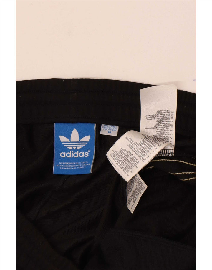 Мужские спортивные брюки Adidas среднего размера из полиэстера черного цвета