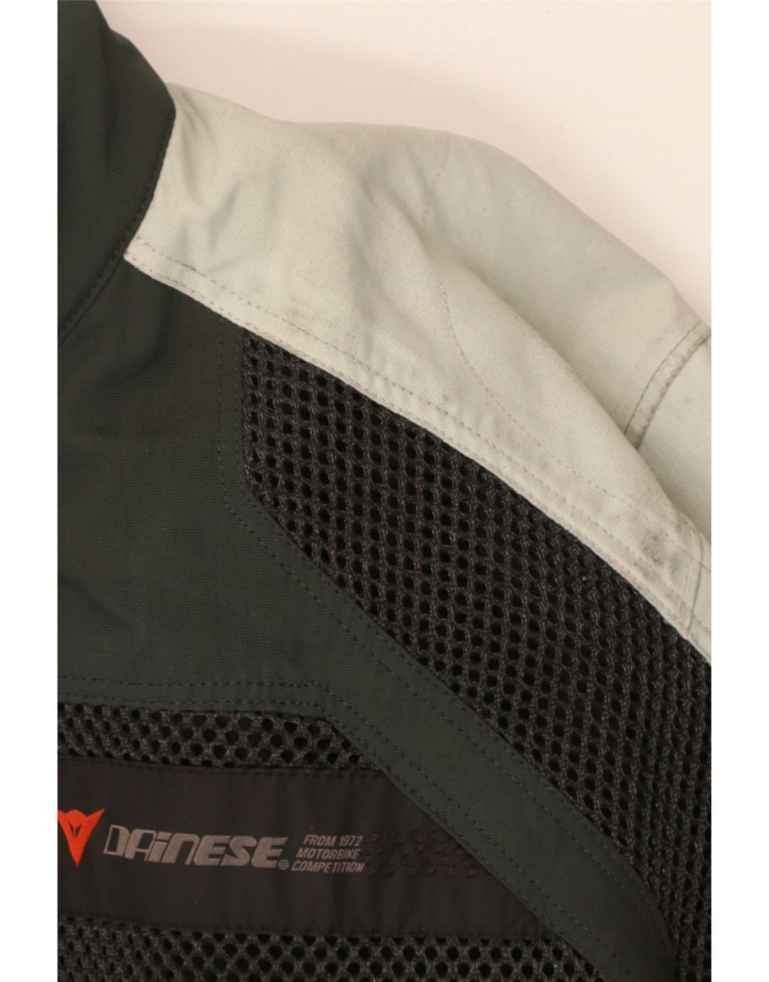 Женская гоночная куртка Dainese с графическим рисунком EU 52, нейлон среднего серого цвета с цветными блоками