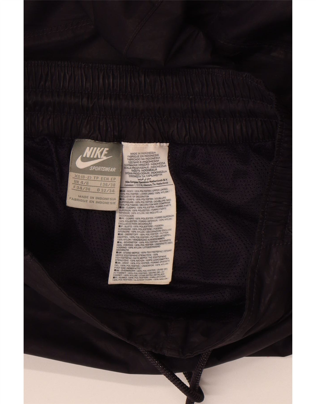 Женские спортивные брюки с графическим рисунком Nike UK 4/6 XS, черный полиэстер