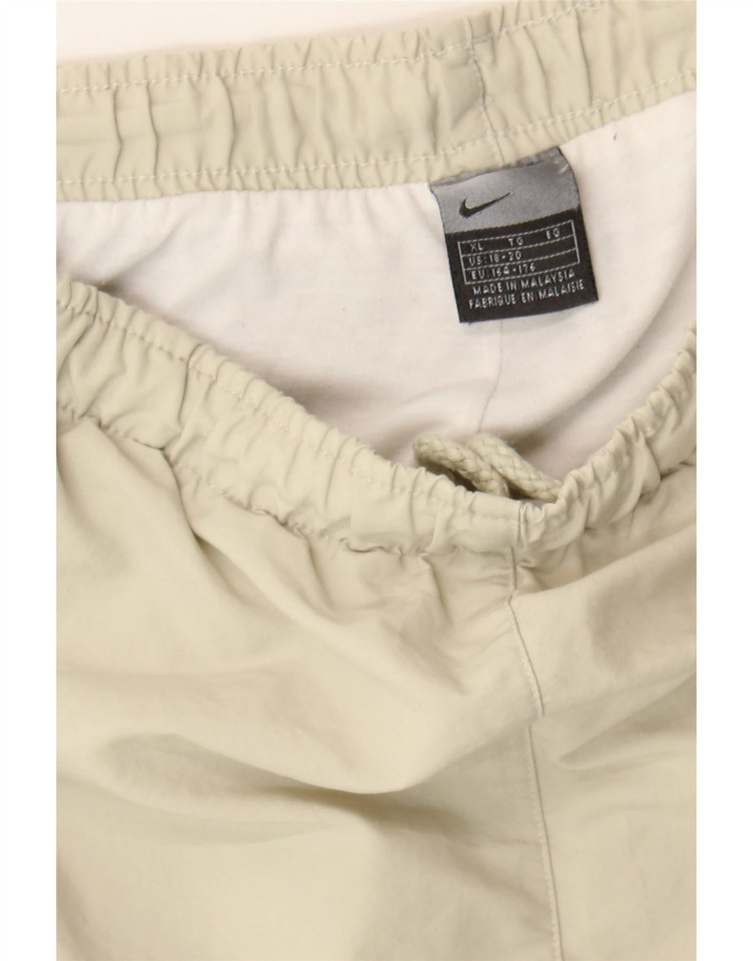 NIKE Boys Tracksuit Trousers 15-16 Years XL Beige Vintage Nike and Second-Hand Nike from Messina Hembry 