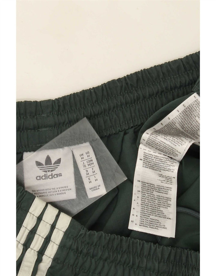 Adidas Мужские брюки-карго из полиамида среднего зеленого цвета