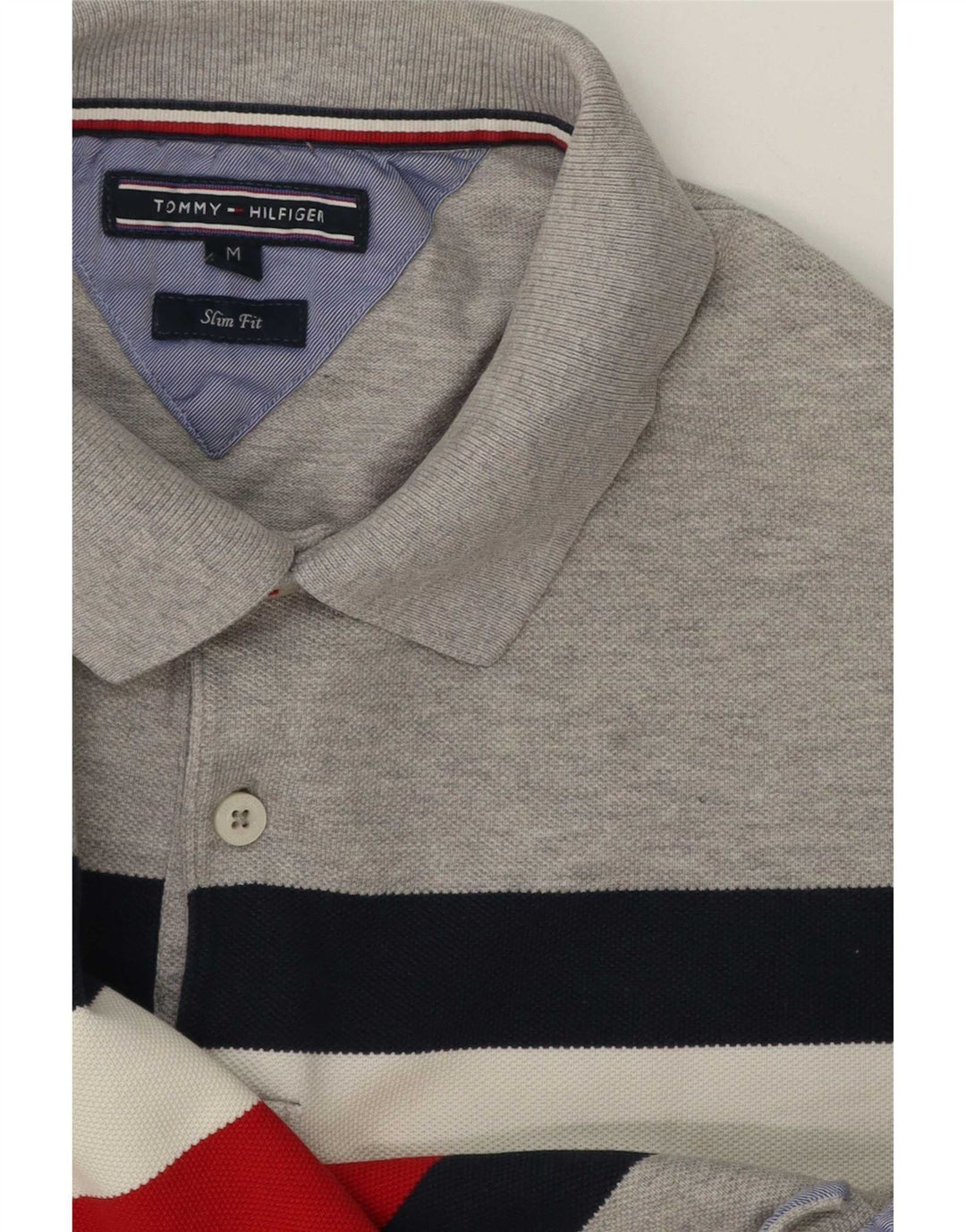 Мужская рубашка-поло приталенного кроя Tommy Hilfiger среднего серого цвета с цветными блоками