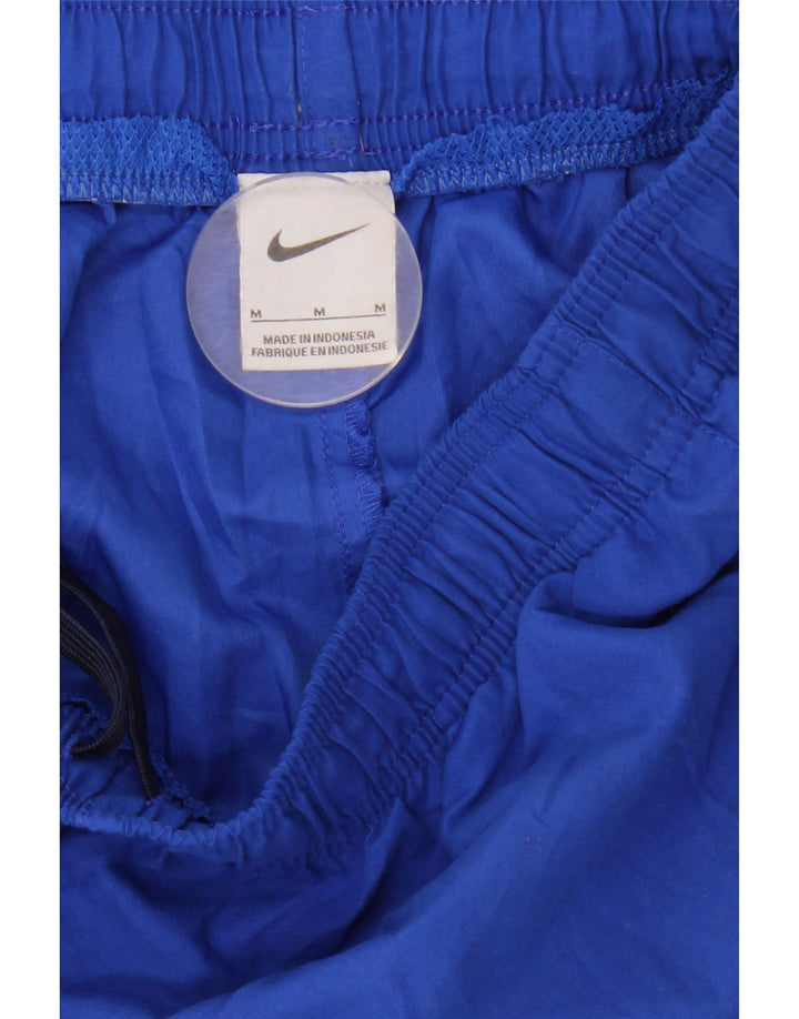 Мужские спортивные шорты Nike среднего синего цвета