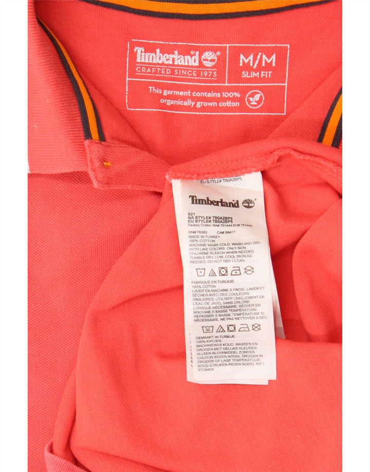 Мужская рубашка-поло приталенного кроя Timberland из хлопка среднего розового цвета