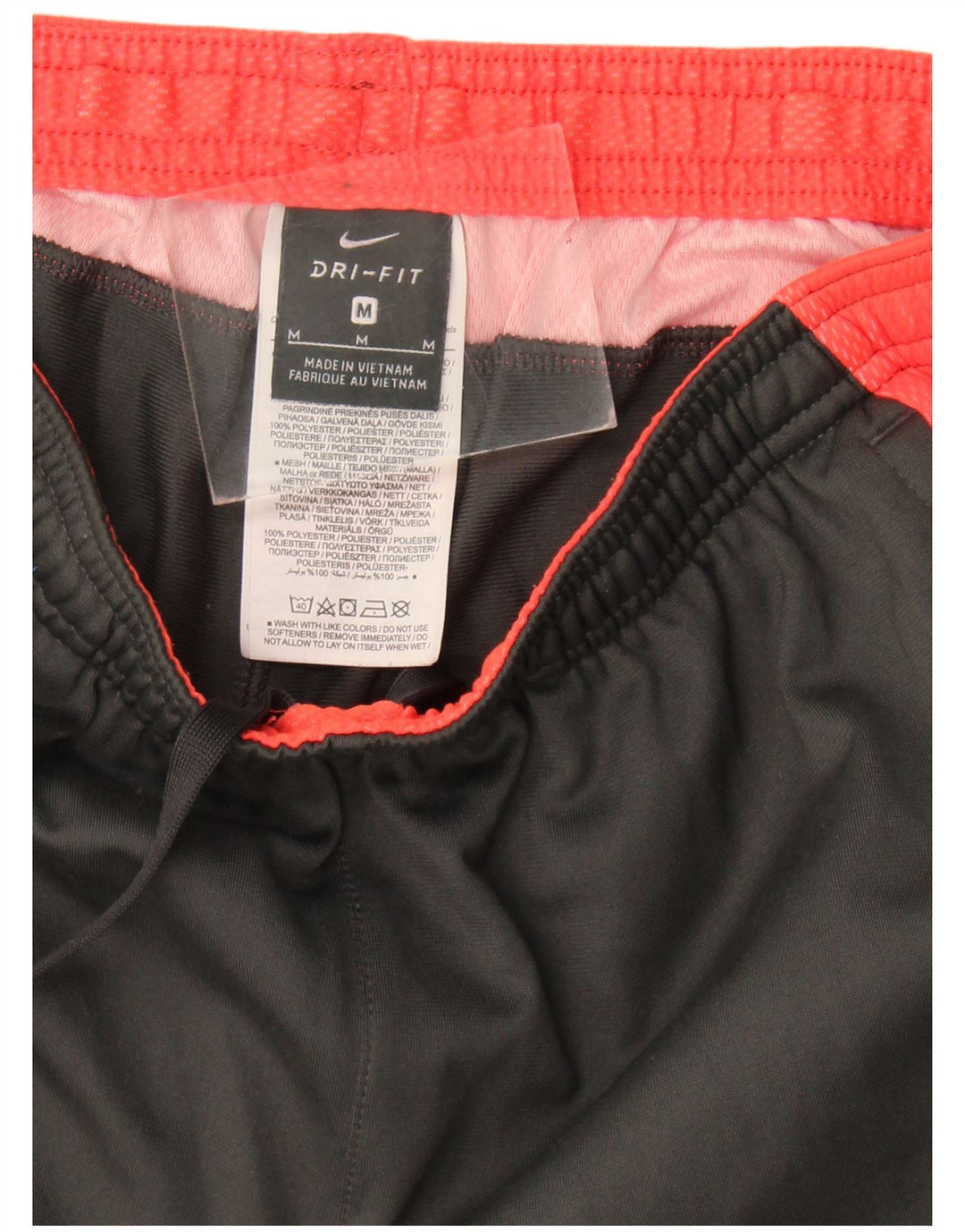 Мужские спортивные брюки Nike Dri Fit среднего серого цвета из полиэстера с цветными блоками