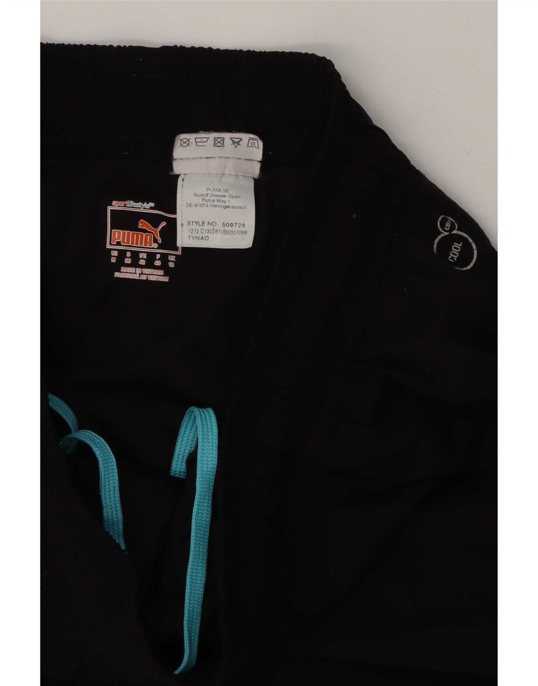 Женские спортивные шорты Puma UK 12, средние, черные с геометрическим рисунком
