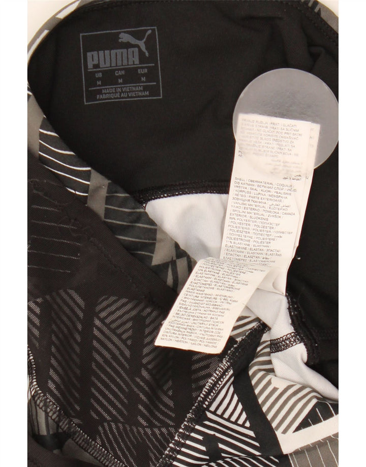 Женские леггинсы-капри Puma UK 12, средний черный полиэстер с геометрическим рисунком