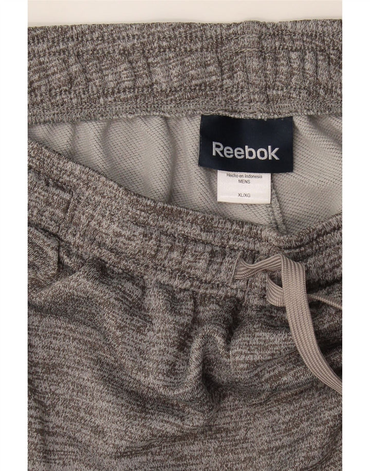 REEBOK Mens Graphic Tracksuit Trousers Joggers XL Grey Flecked Polyester Vintage Reebok and Second-Hand Reebok from Messina Hembry 