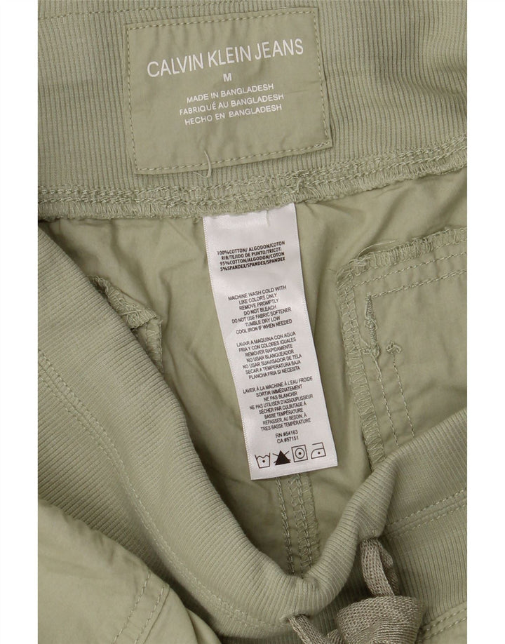 Женские шорты чинос Calvin Klein среднего цвета W30, хлопок цвета хаки