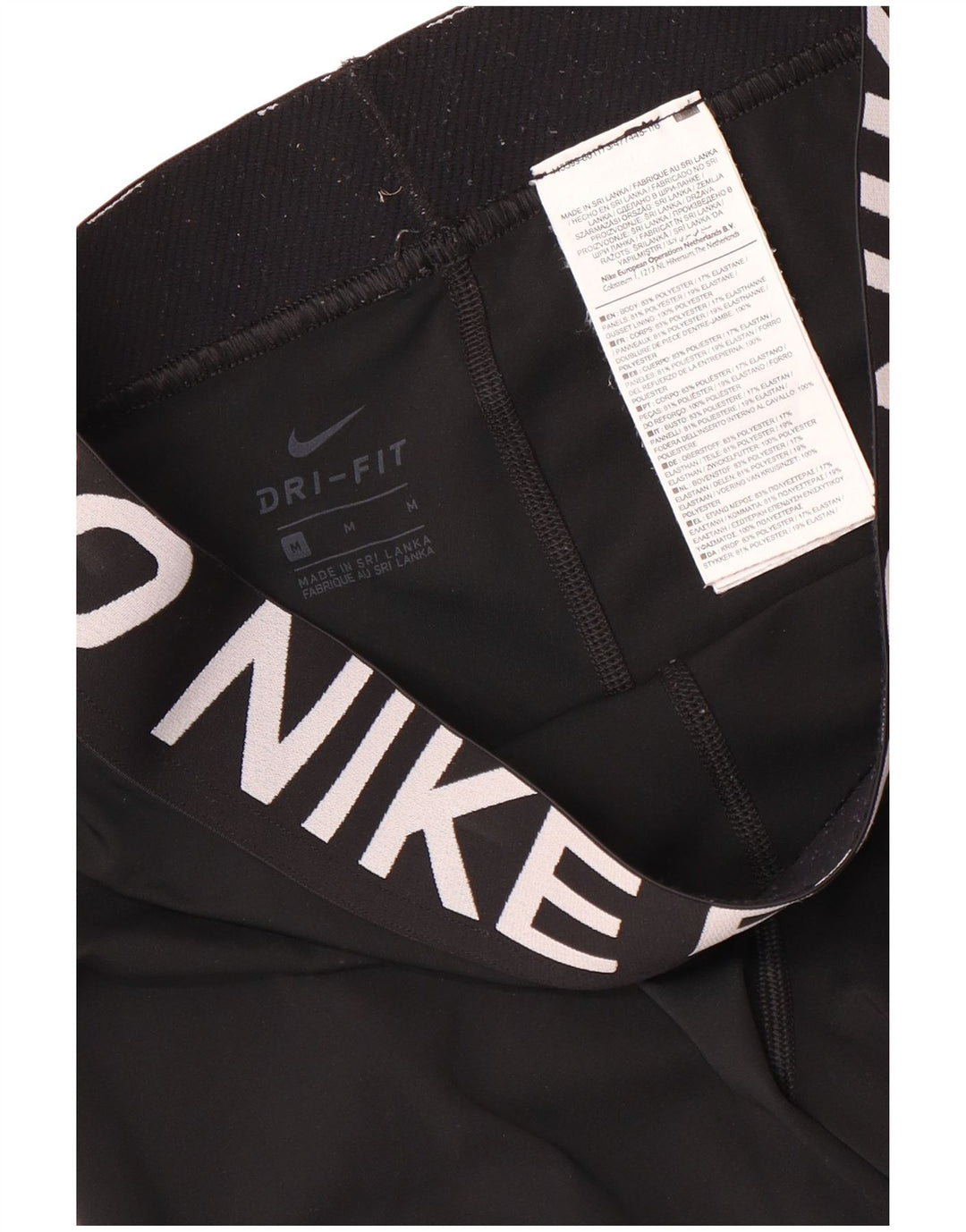 Женские леггинсы-капри с графическим рисунком Nike Dri Fit UK 12, средний черный полиэстер