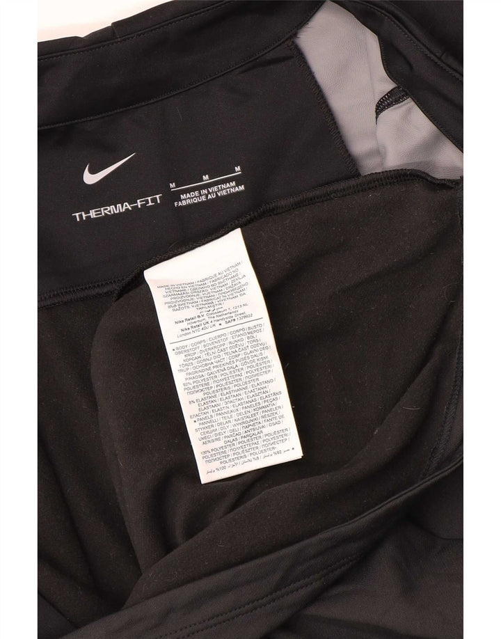 Мужская спортивная куртка Nike Therma-Fit среднего размера с цветными блоками черного цвета