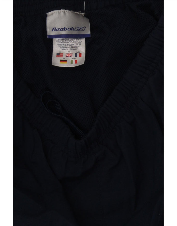 REEBOK Womens Tracksuit Trousers UK 10 Small  Navy Blue Polyester Vintage Reebok and Second-Hand Reebok from Messina Hembry 