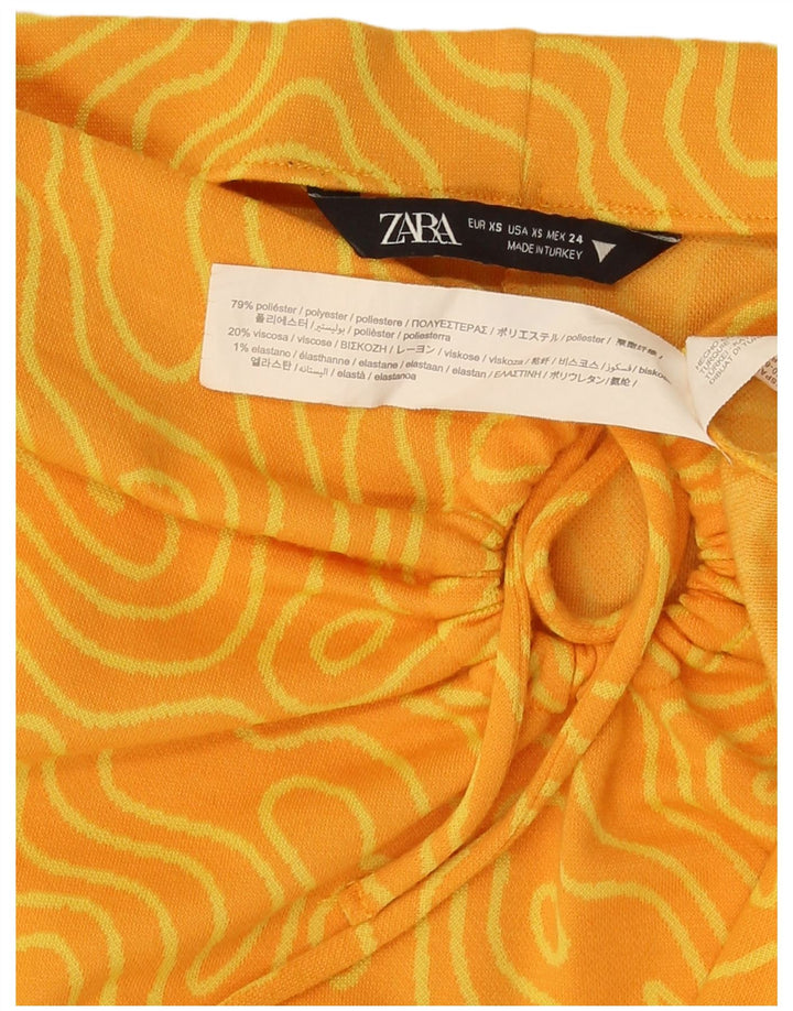 Женская юбка-миди Zara XS W26, желтый полиэстер с геометрическим рисунком