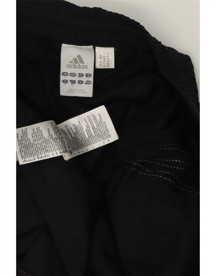 Женские спортивные брюки Adidas Clima Proof UK 12, средний черный полиэстер