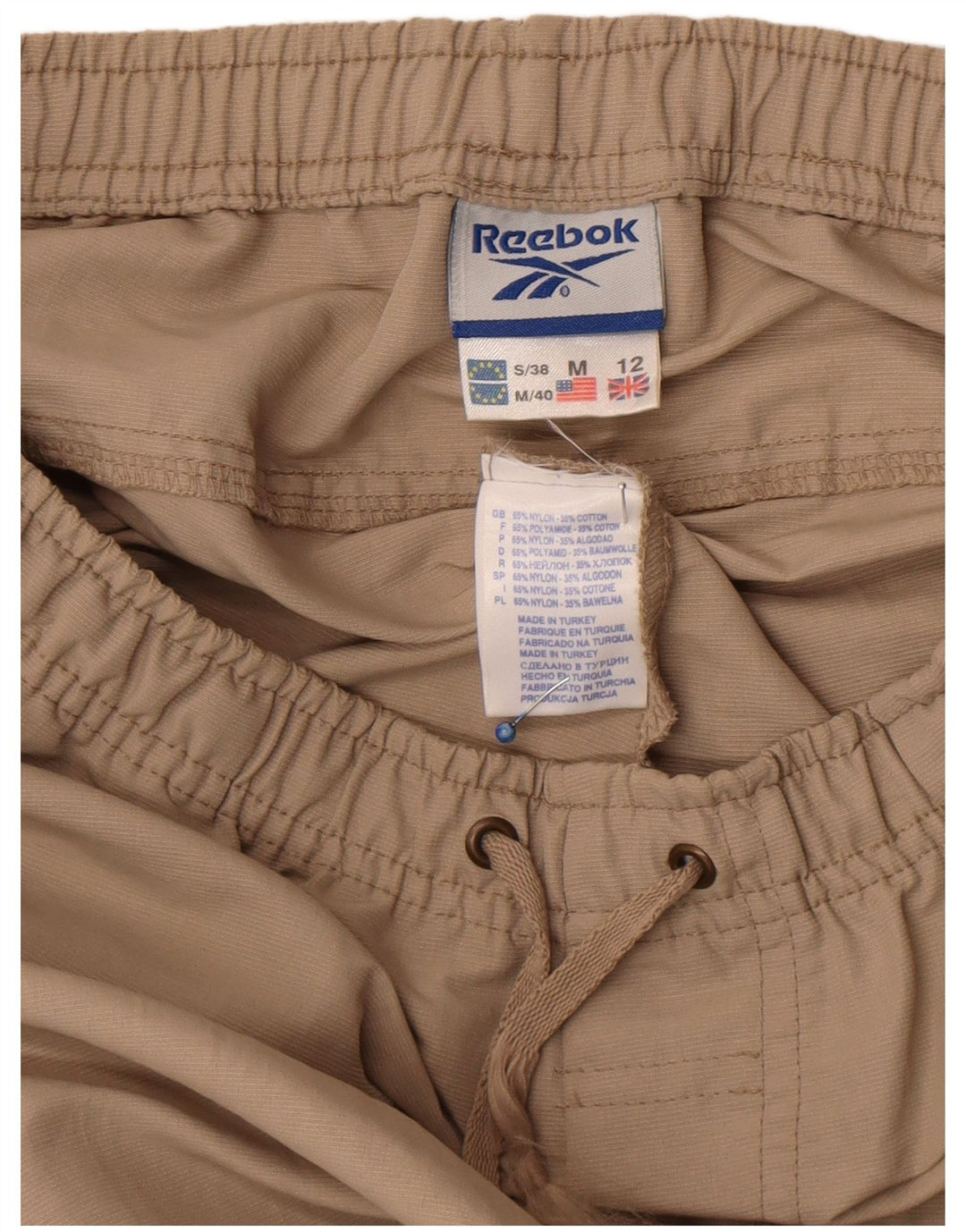 Женские спортивные брюки Reebok UK 12, средние, бежевые, нейлоновые