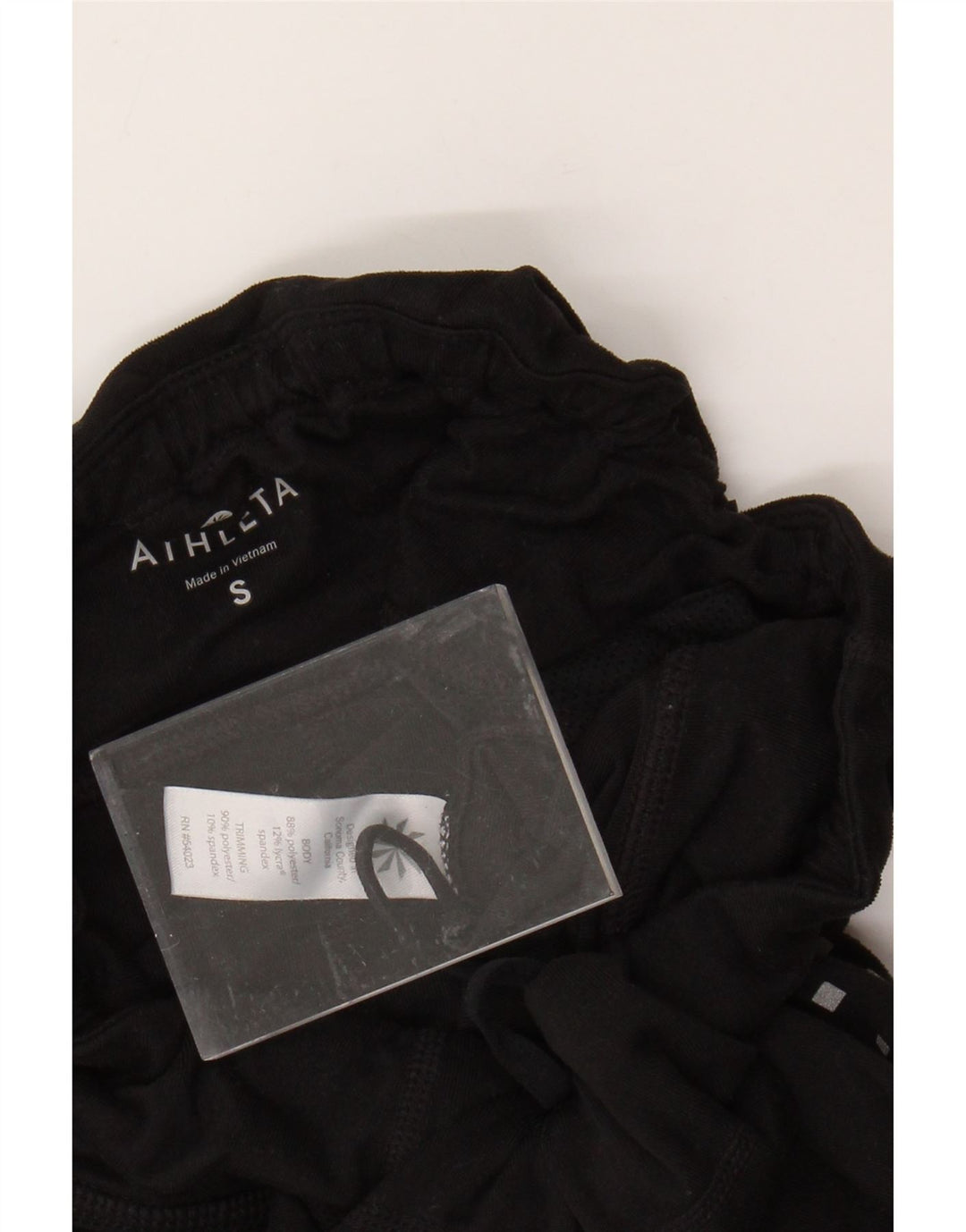 Женские леггинсы ATHLETA UK 10, маленькие черные, полиэстер с геометрическим рисунком