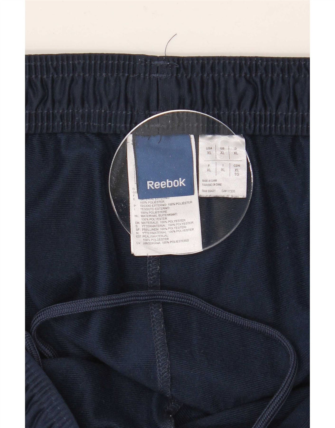 Мужские спортивные брюки Reebok с графическим рисунком XL, темно-синие, полиэстер с цветными блоками