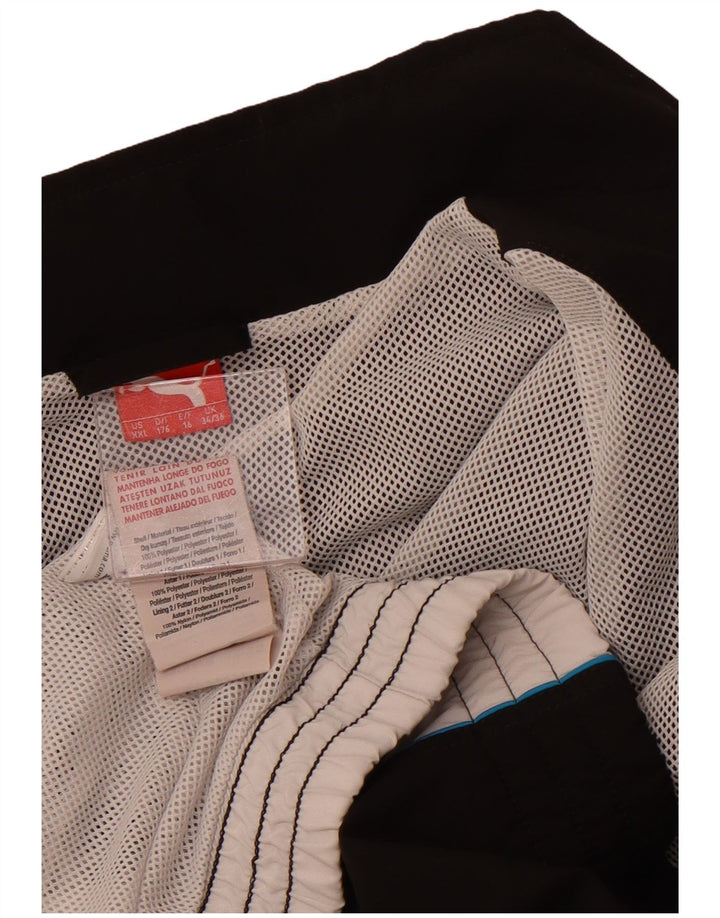 Спортивный костюм PUMA для мальчиков с графическим рисунком, верхняя куртка 15–16 лет, черный с цветными блоками