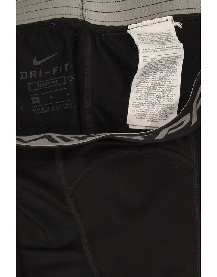 Женские леггинсы с рисунком Nike Dri Fit UK 12, средний черный, полиэстер