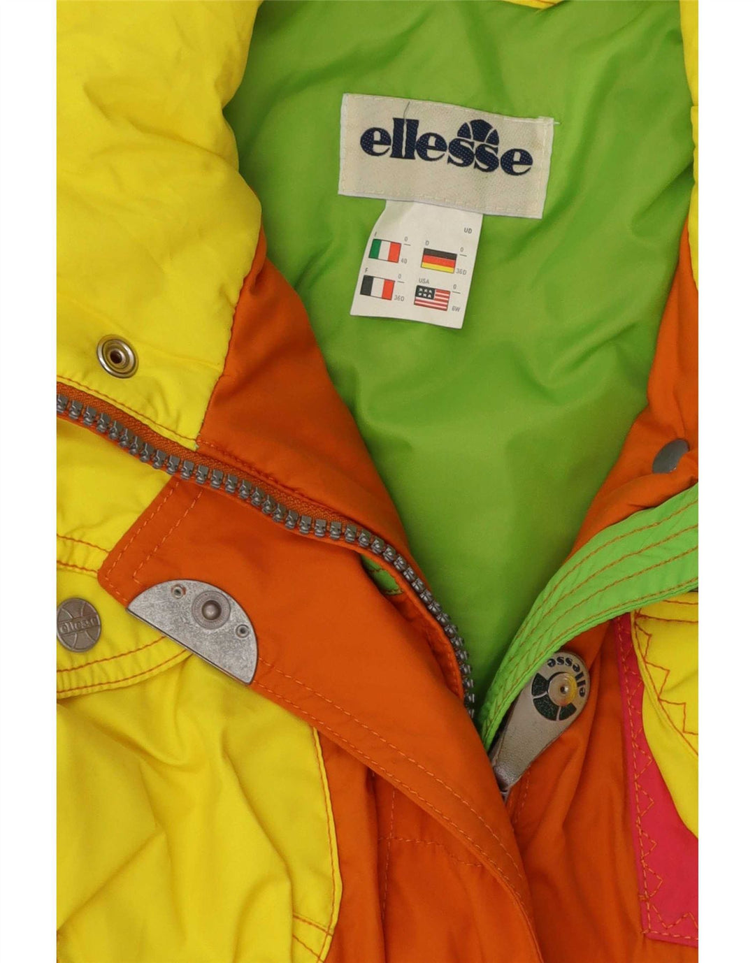 Женский лыжный комбинезон Ellesse IT 40 маленький оранжевый цветных блоков