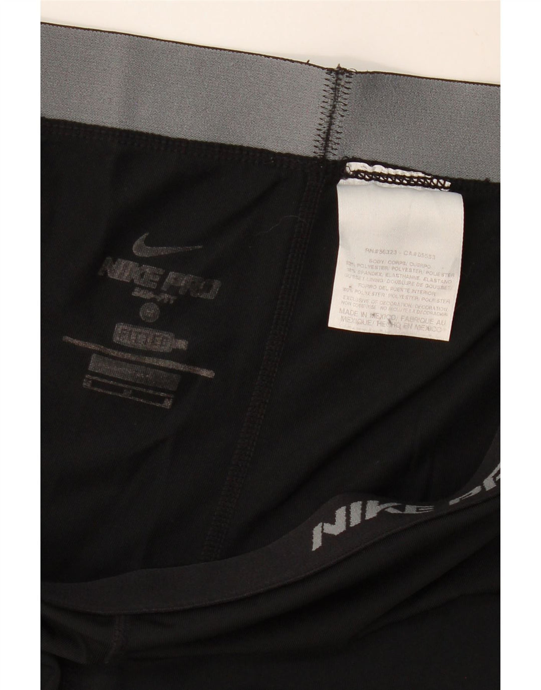 Женские спортивные брюки Nike Dri Fit UK 12, средний черный полиэстер