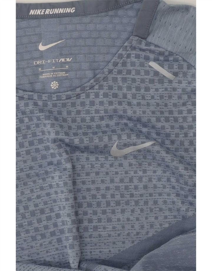 Женская футболка Nike Dri Fit Top UK 14, средний синий полиэстер с геометрическим рисунком