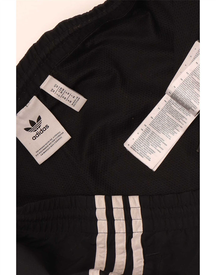 Мужские спортивные брюки Adidas для бега, средние черные полиэстер с цветными блоками