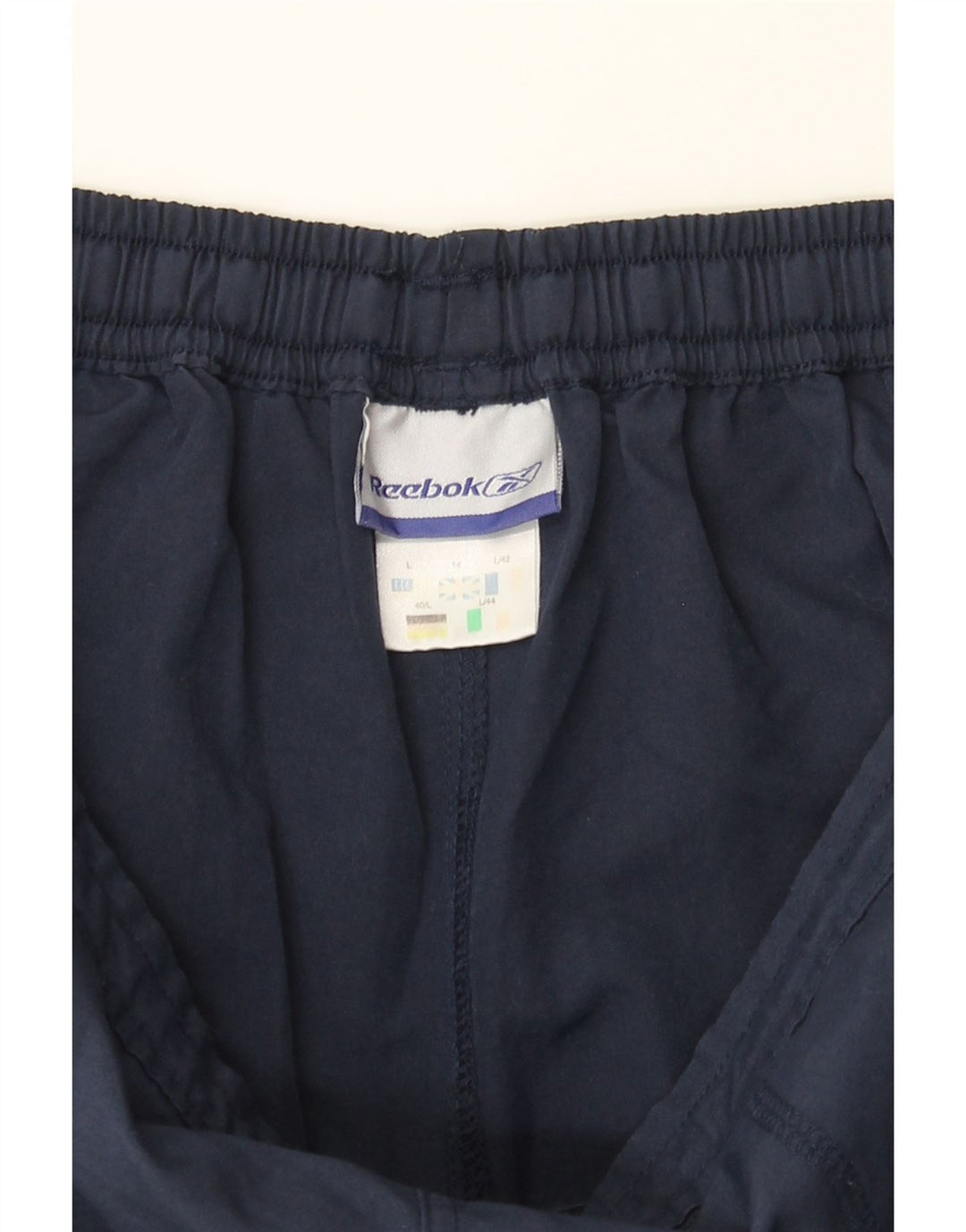 REEBOK Womens Tracksuit Trousers UK 14 Large Navy Blue Polyester Vintage Reebok and Second-Hand Reebok from Messina Hembry 