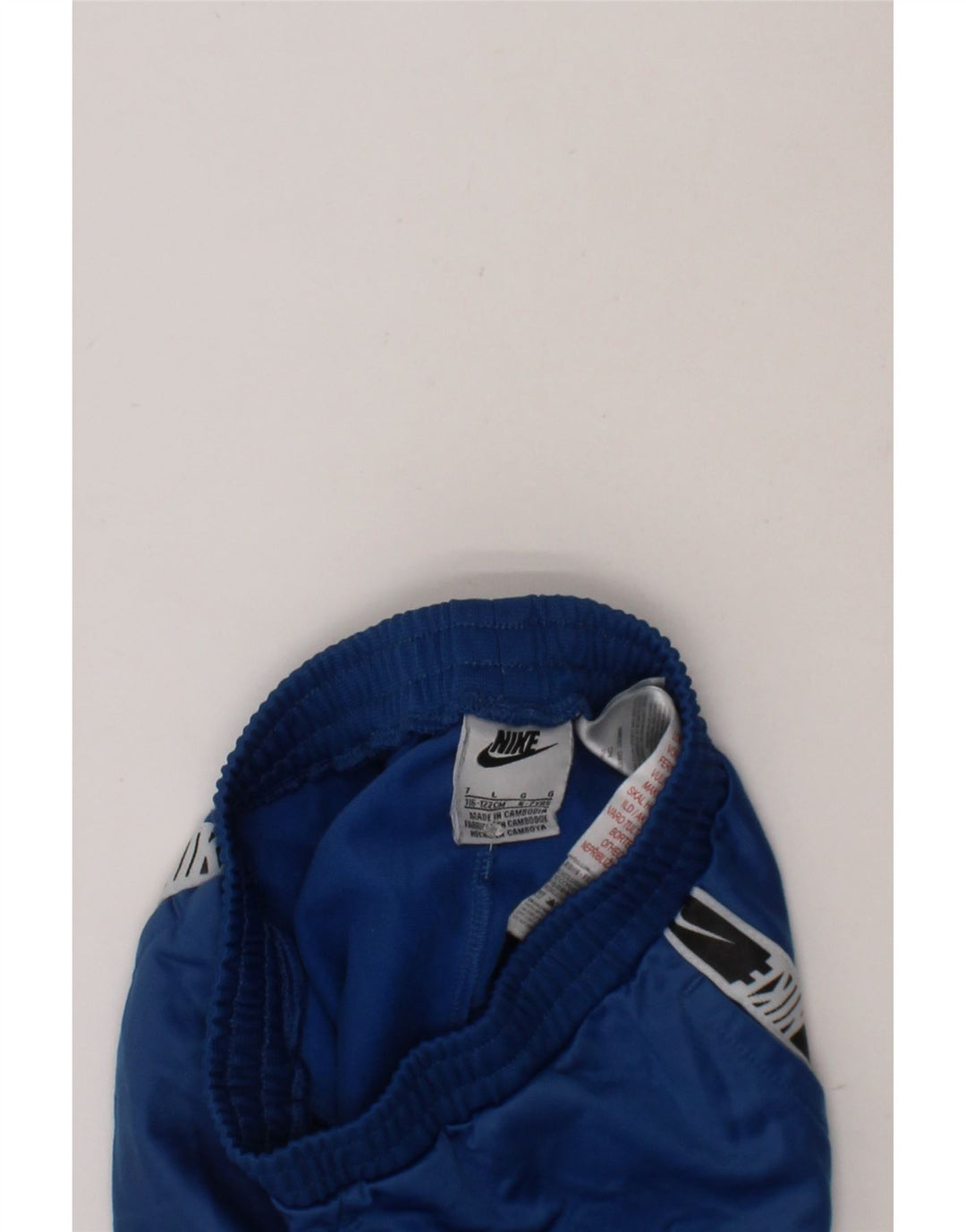 NIKE Boys Graphic Sport Shorts 6-7 Years Large  Navy Blue Polyester Vintage Nike and Second-Hand Nike from Messina Hembry 